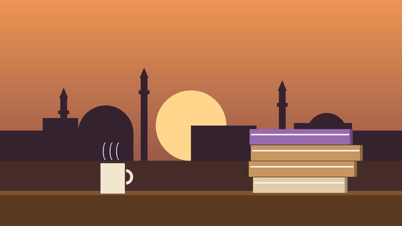 قبابٌ ومآذن عند الغروب خلف كتبٍ مكدّسة