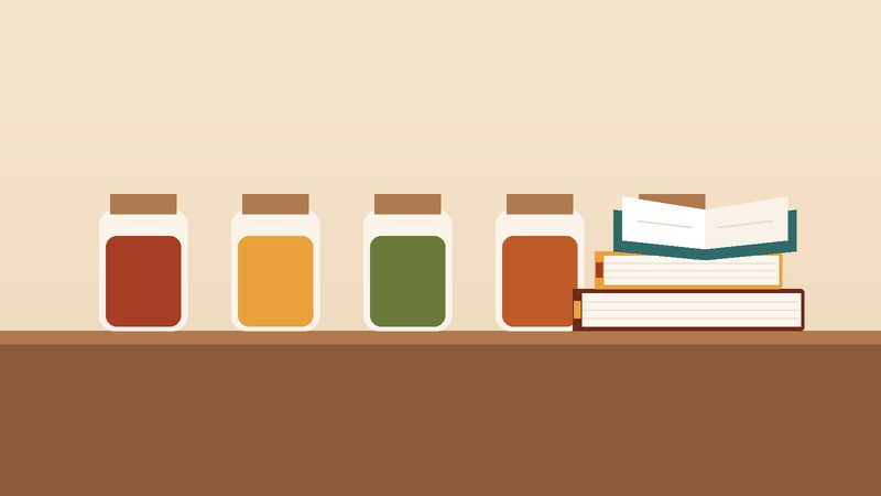 برطماناتٌ ملوّنة وكتبٌ مكدّسة على رفٍّ خشبيّ